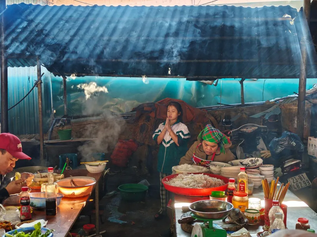 Bustling Vietnamese market where cooking class ingredients are sourced
