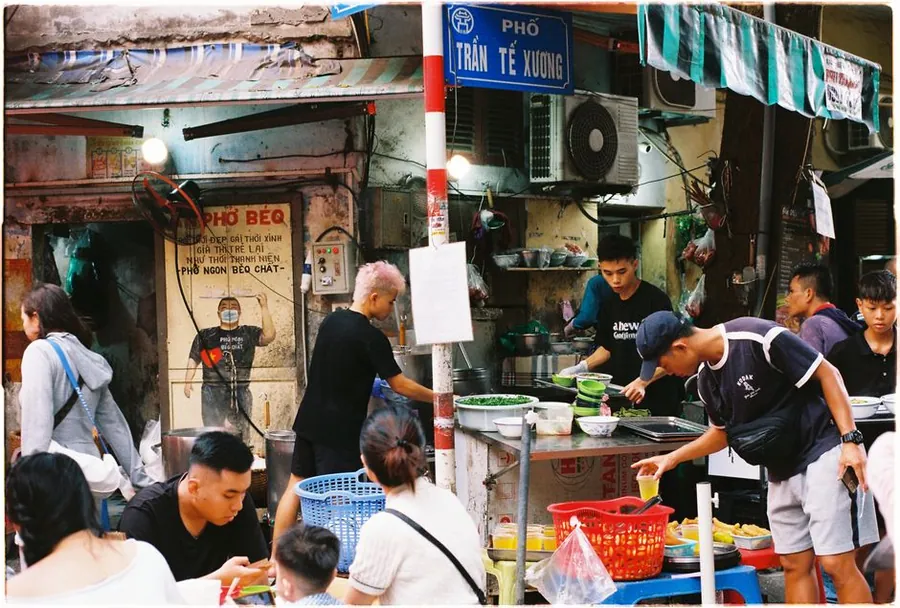 Vibrant street food stall in the Old Quarter, Hanoi